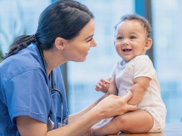 pediatric nurse and infant