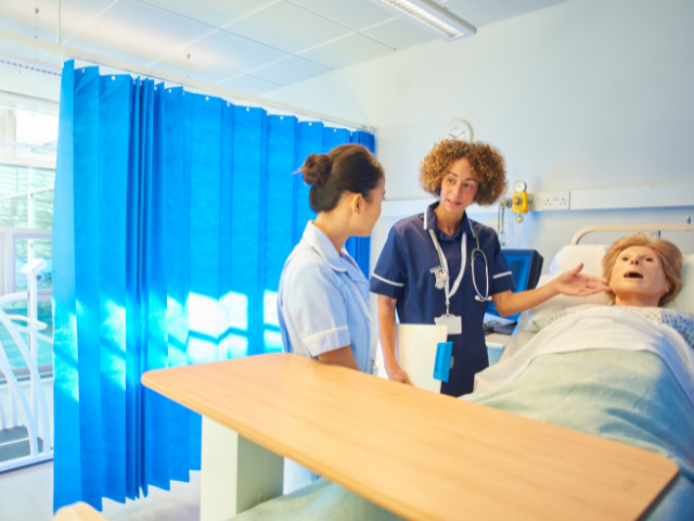A nurse manager works with a young nurse to try and prevent early-tenure nurse turnover.