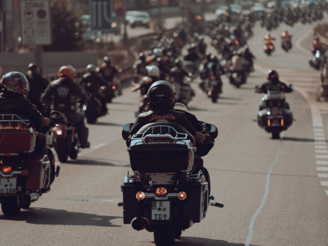 Motorcyclists on the open road, like those in the Miracle Riders.
