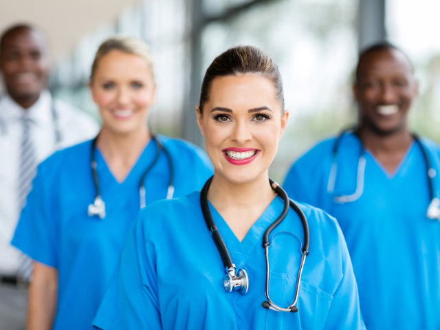 A group of nurses pose for a photo